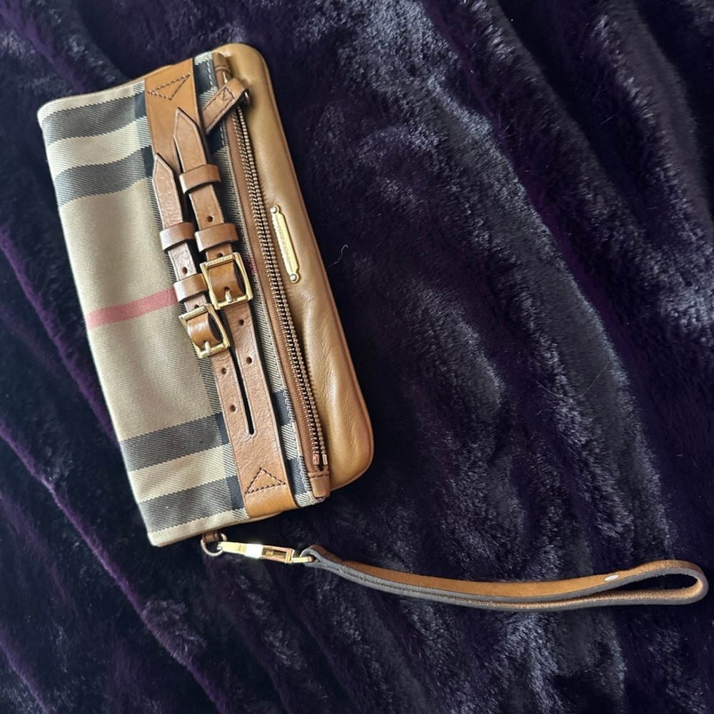 A Burberry wristlet clutch for women